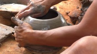  CURTA-METRAGEM - LOGA: M�OS DE BARRO NO SERT�O.